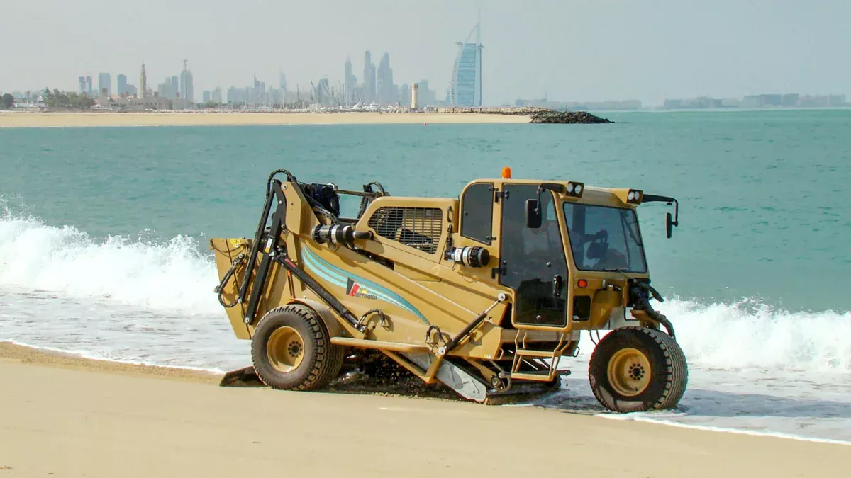 Cherrington drives along the beach